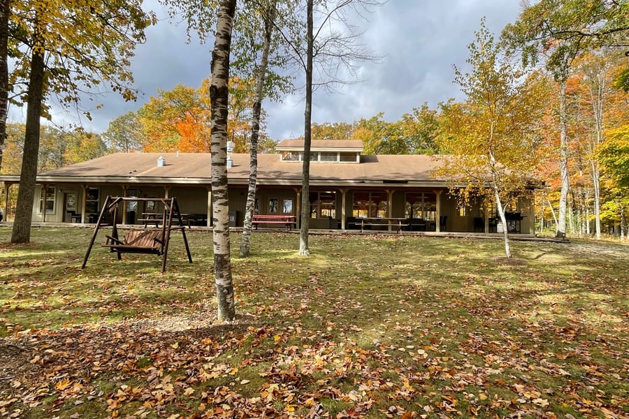 The Main Lodge dining room and gathering space at Arrowhead Lake Camp